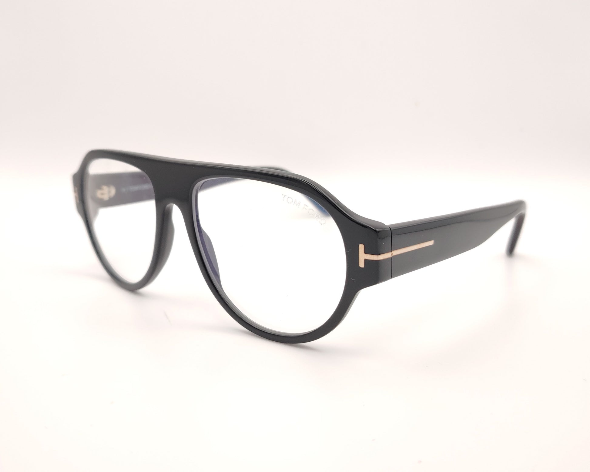 gafas tom ford negras de acetato estilo aviador con frontal amplio y varillas anchas