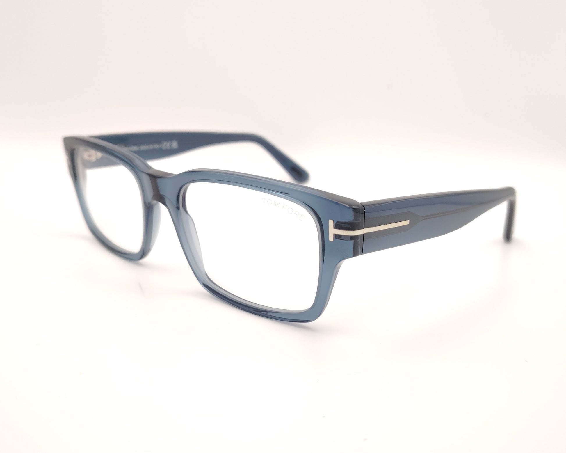 gafas graduadas tom ford rectangulares en azul translúcido con detalle metálico en las varillas