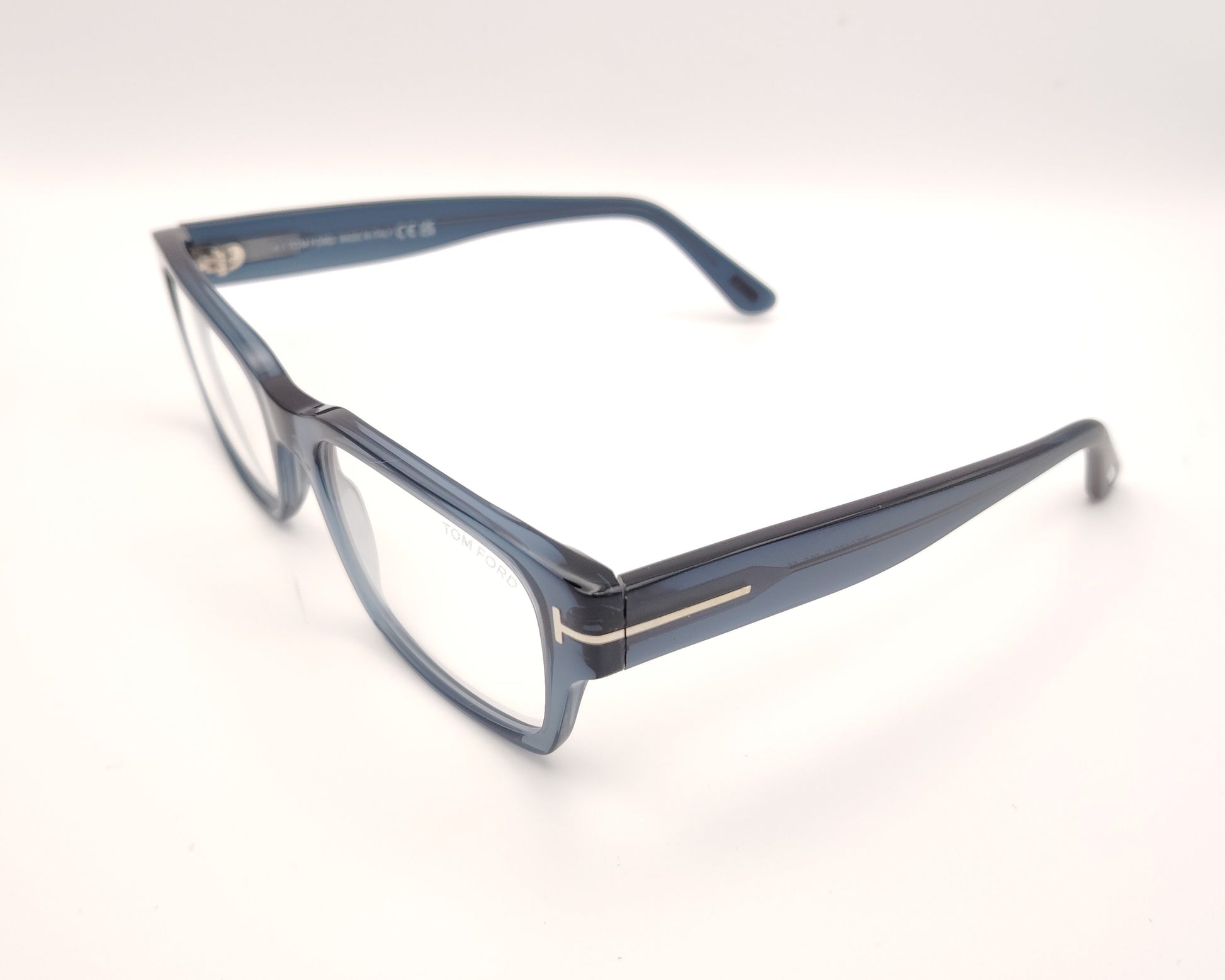 gafas graduadas tom ford rectangulares en azul translúcido con detalle metálico en las varillas