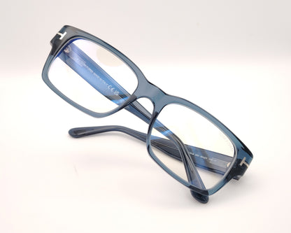 gafas graduadas tom ford rectangulares en azul translúcido con detalle metálico en las varillas