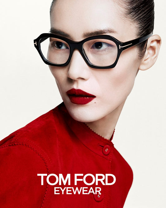 gafas tom ford negras de acetato con frontal geométrico redondeado y detalle metálico en las varillas