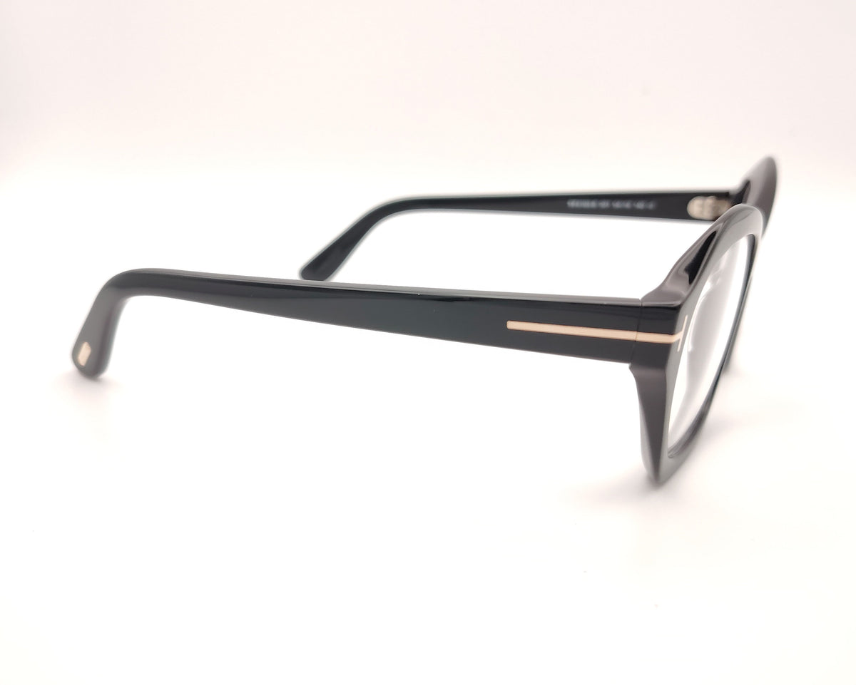 gafas tom ford negras de acetato con frontal geométrico redondeado y detalle metálico en las varillas