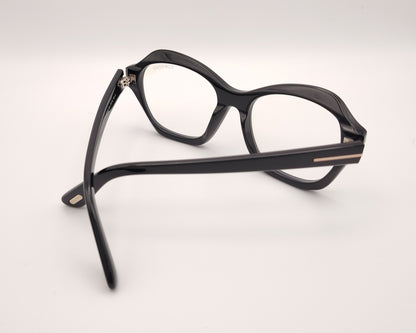 gafas tom ford negras de acetato con frontal geométrico redondeado y detalle metálico en las varillas