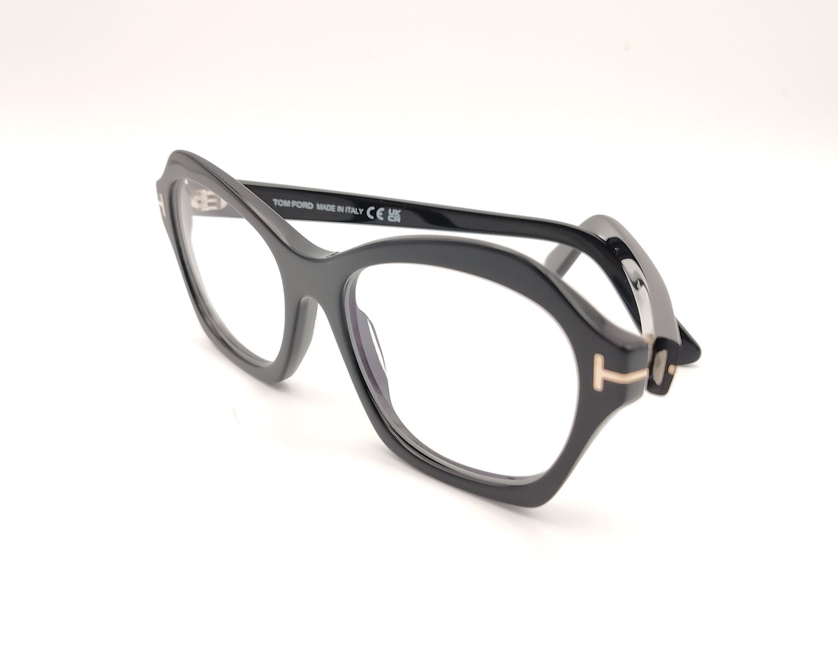 gafas tom ford negras de acetato con frontal geométrico redondeado y detalle metálico en las varillas