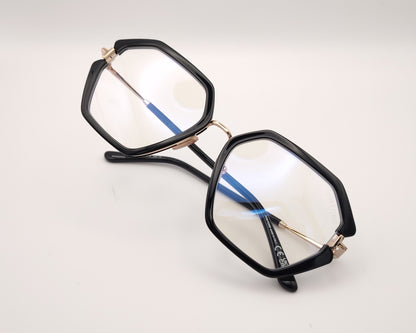 gafas tom ford geométricas negras oversize con detalles dorados y puente metálico