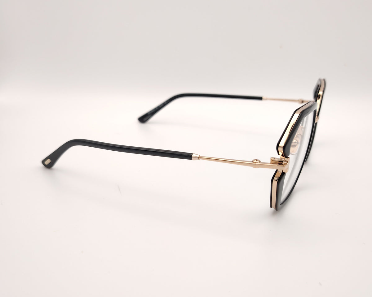 gafas tom ford geométricas negras oversize con detalles dorados y puente metálico