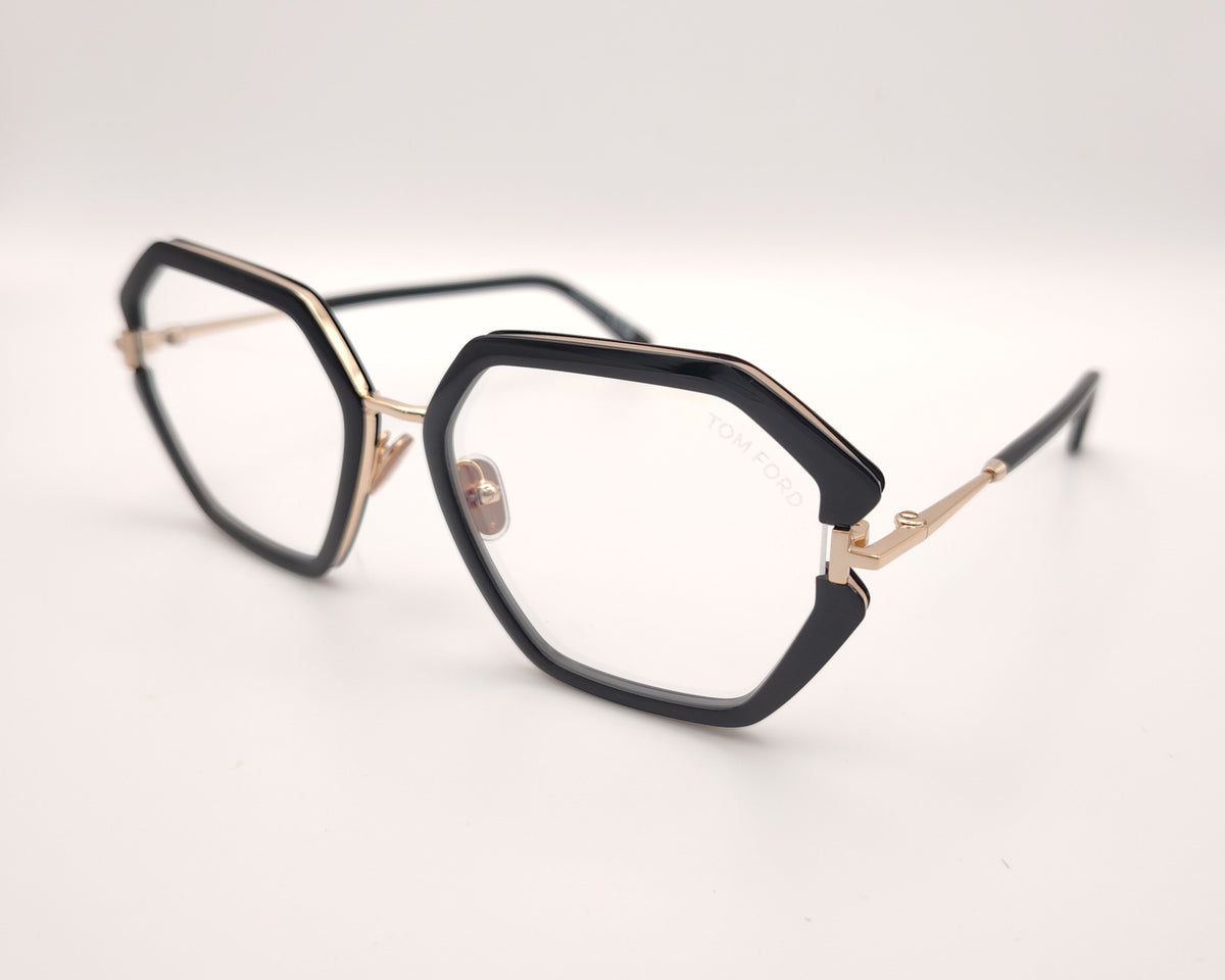 gafas tom ford geométricas negras oversize con detalles dorados y puente metálico