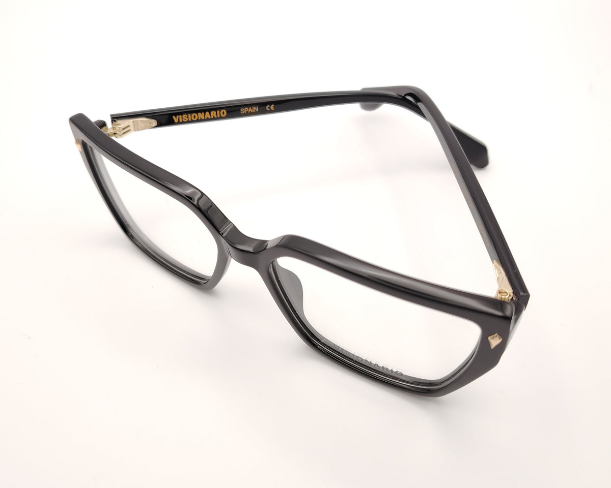 gafas de pasta negras con forma rectangular y detalle dorado en las esquinas delanteras, modelo visionario