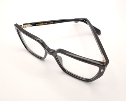 gafas de pasta negras con forma rectangular y detalle dorado en las esquinas delanteras, modelo visionario