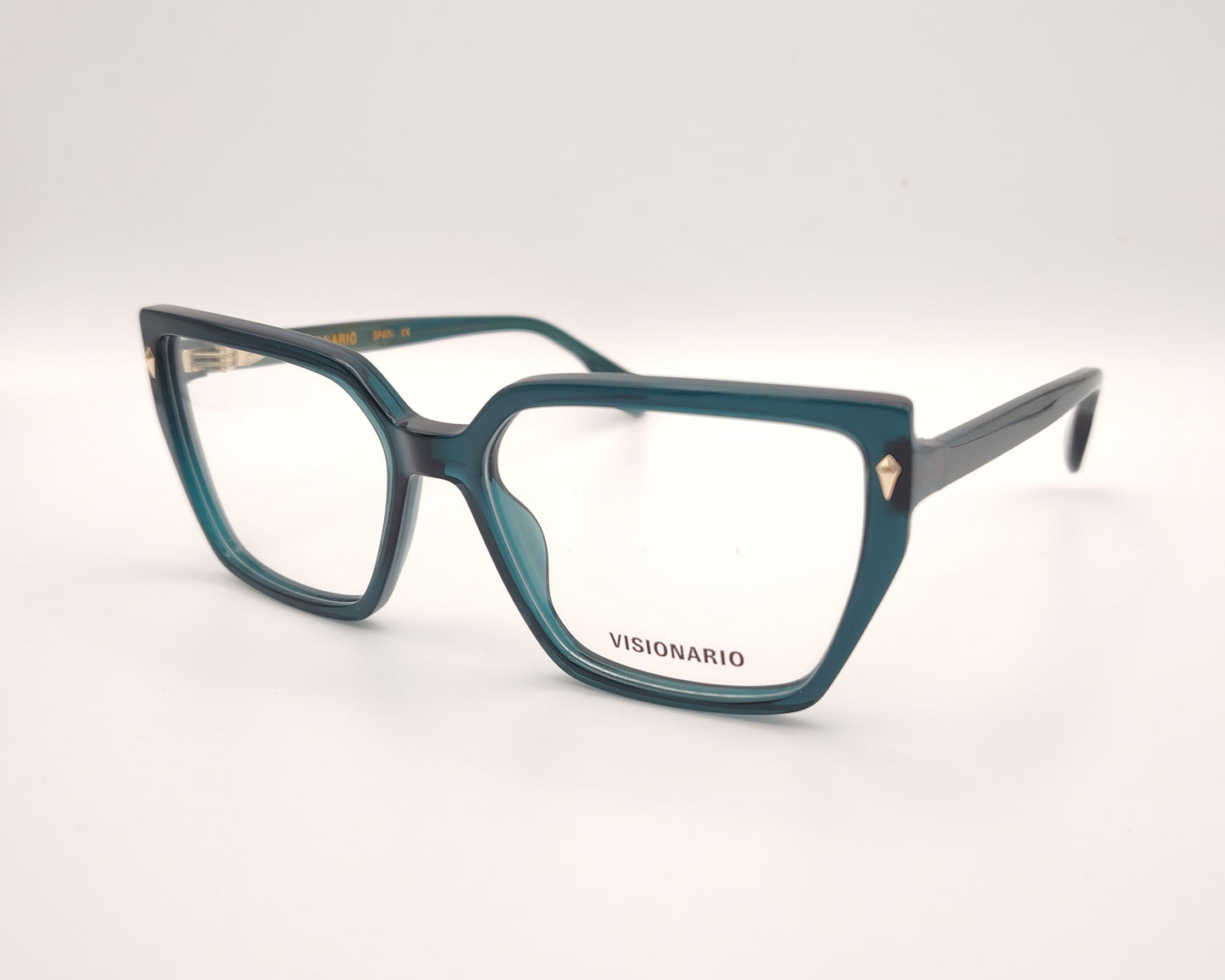 gafas de vista en acetato verde petróleo con forma trapezoidal y detalles metálicos dorados