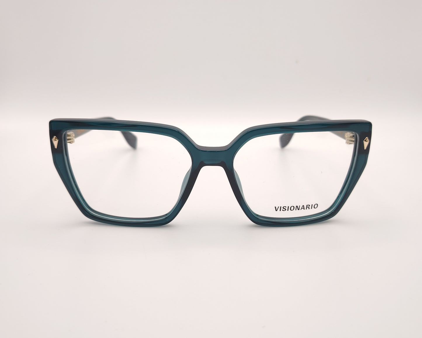 gafas de vista en acetato verde petróleo con forma trapezoidal y detalles metálicos dorados