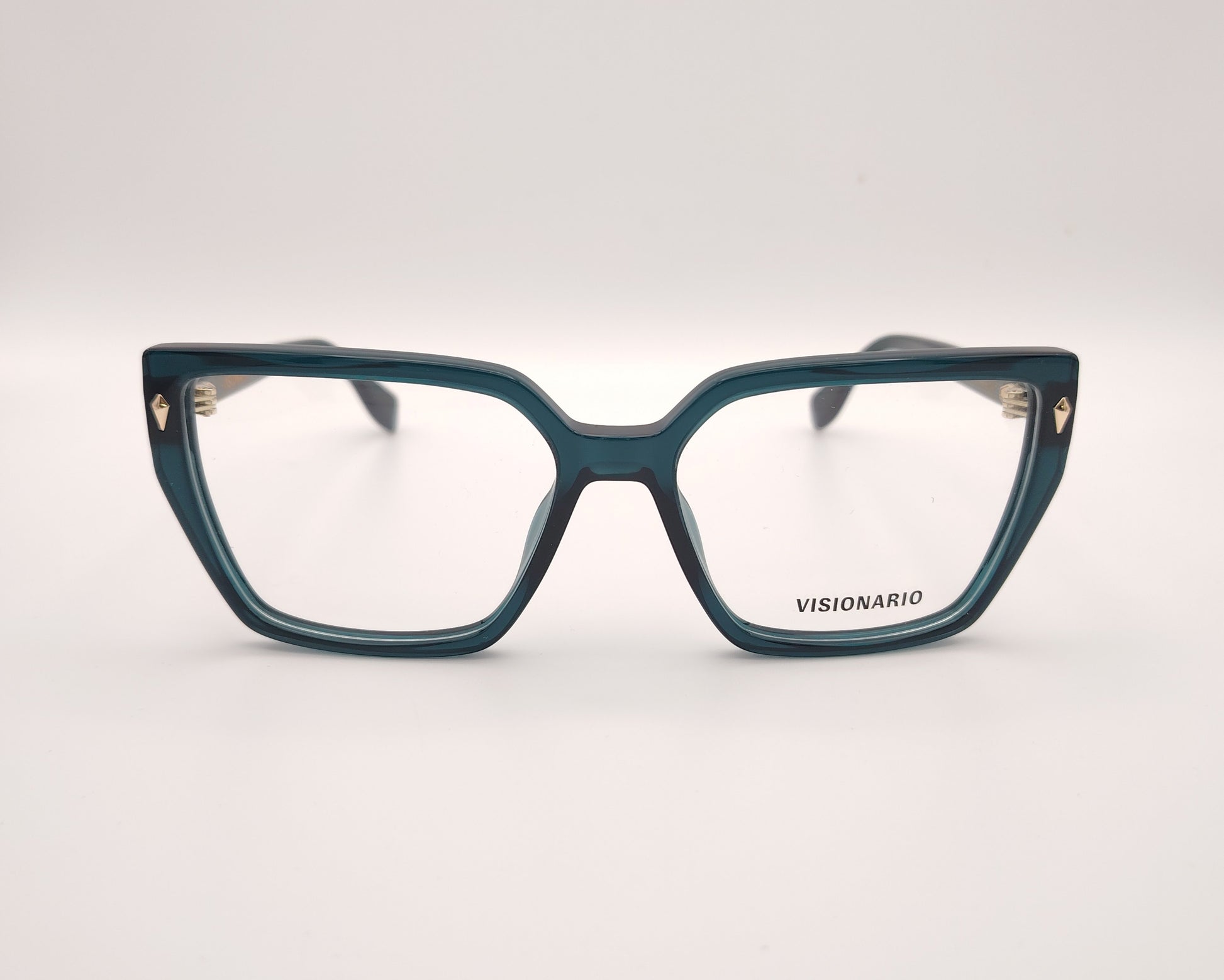 gafas de vista en acetato verde petróleo con forma trapezoidal y detalles metálicos dorados