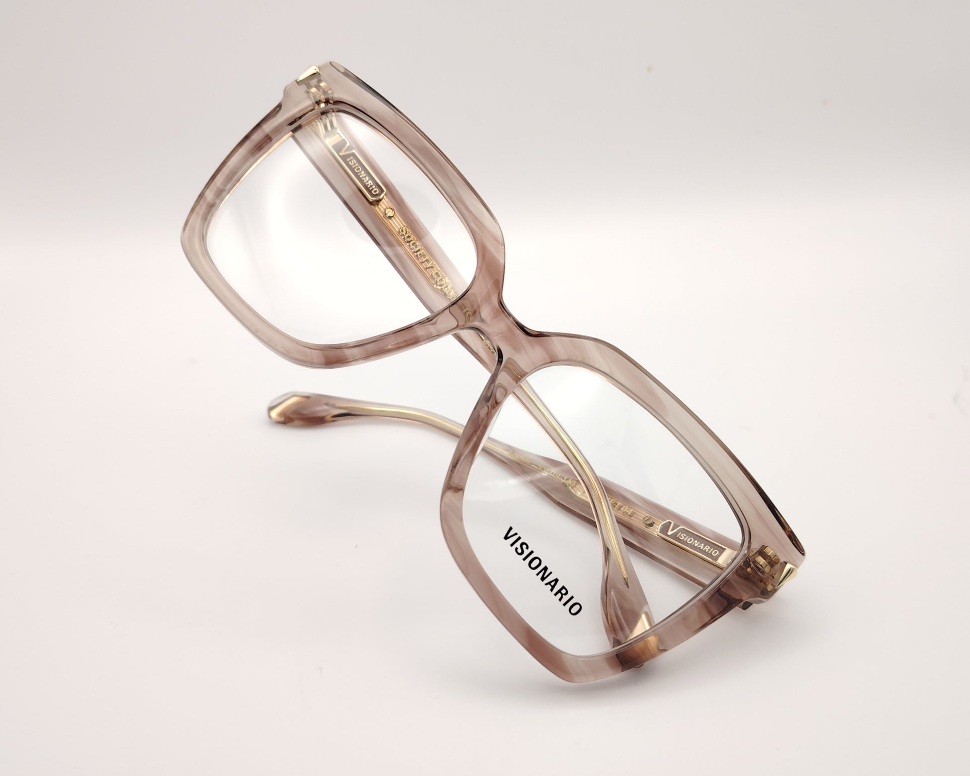 gafas de acetato cuadradas color nude ahumado con detalle dorado en la varilla