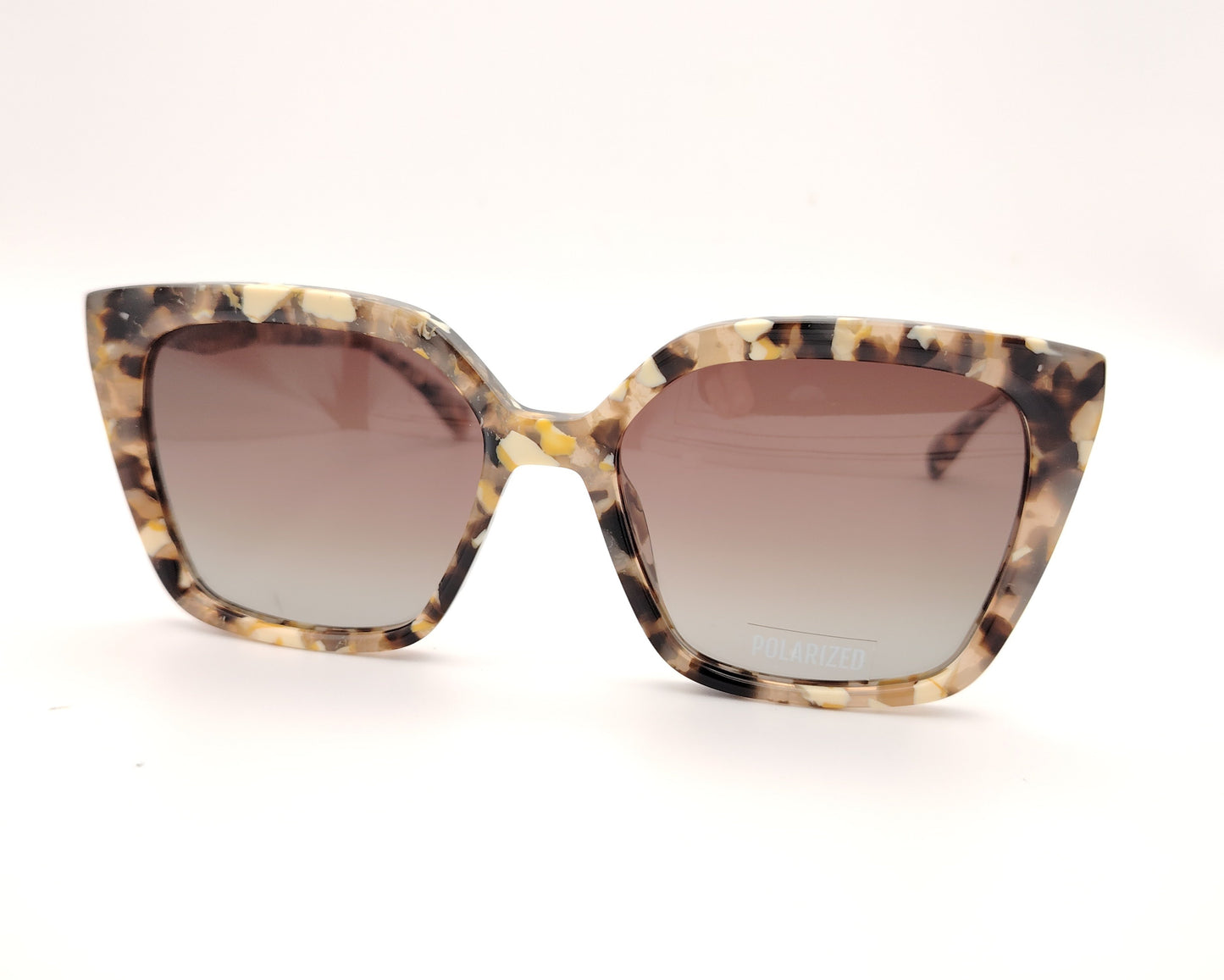 gafas de sol visionario carey jaspeado con lentes polarizadas marrones y forma geométrica ligeramente cat eye