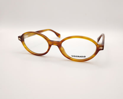 gafas de vista redondas en acetato ámbar con detalles metálicos dorados de la marca visionario