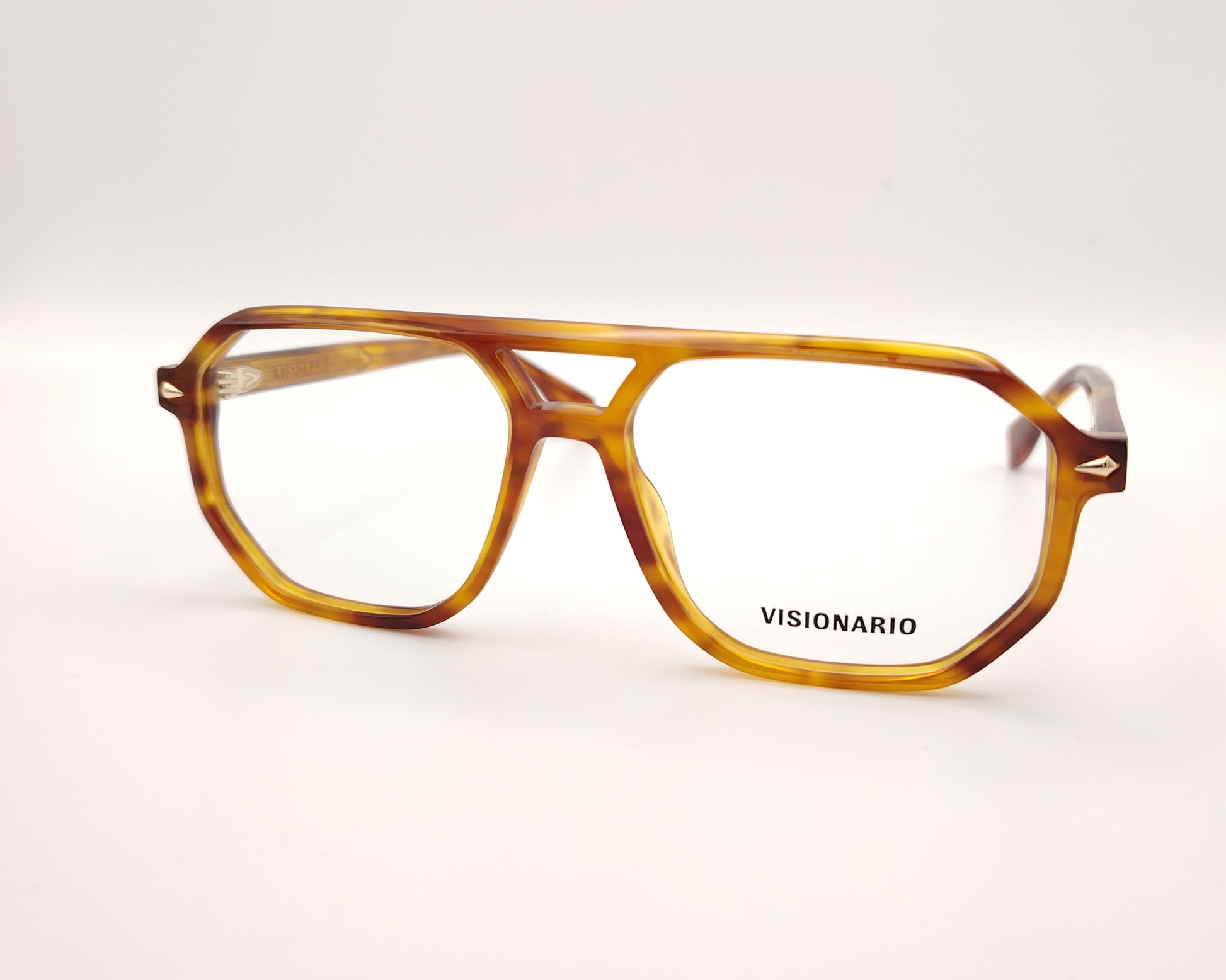 gafas de vista estilo aviador en acetato ámbar con diseño geométrico