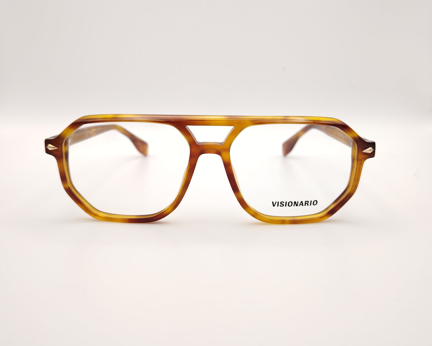 gafas de vista estilo aviador en acetato ámbar con diseño geométrico