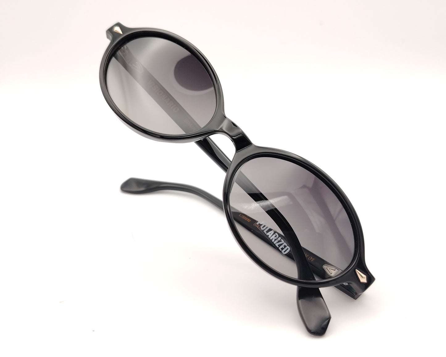 gafas de sol visionario negras ovaladas con lentes polarizadas oscuras