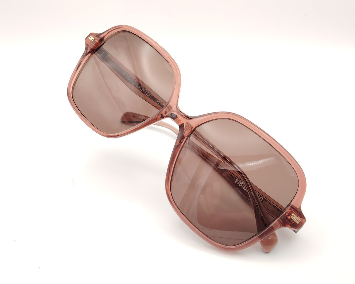 gafas de sol visionario rosa translúcido con lentes polarizadas y montura oversize