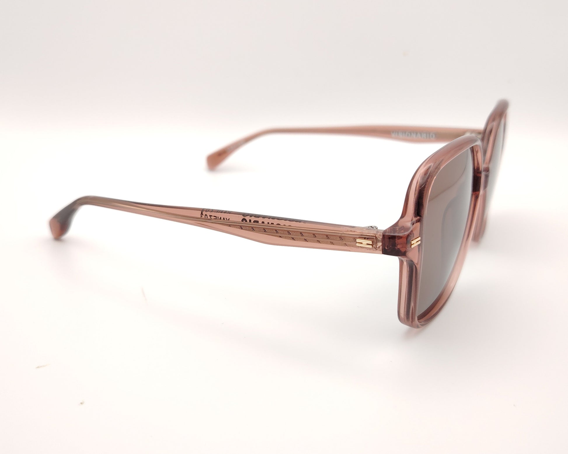gafas de sol visionario rosa translúcido con lentes polarizadas y montura oversize