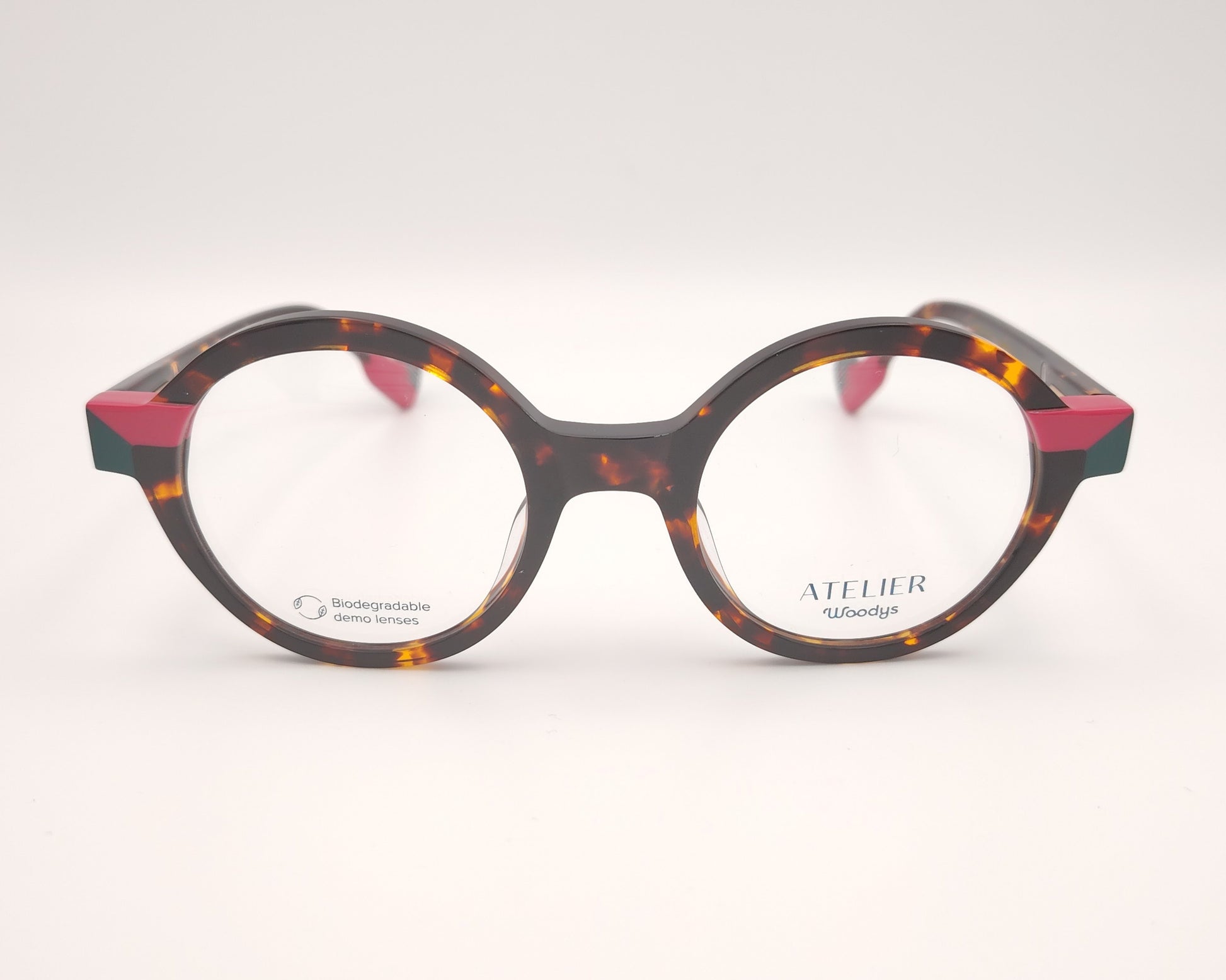 gafas graduadas woodys absinthe 02 redondas carey con detalles en rosa fucsia y verde

