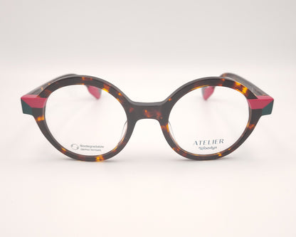 gafas graduadas woodys absinthe 02 redondas carey con detalles en rosa fucsia y verde

