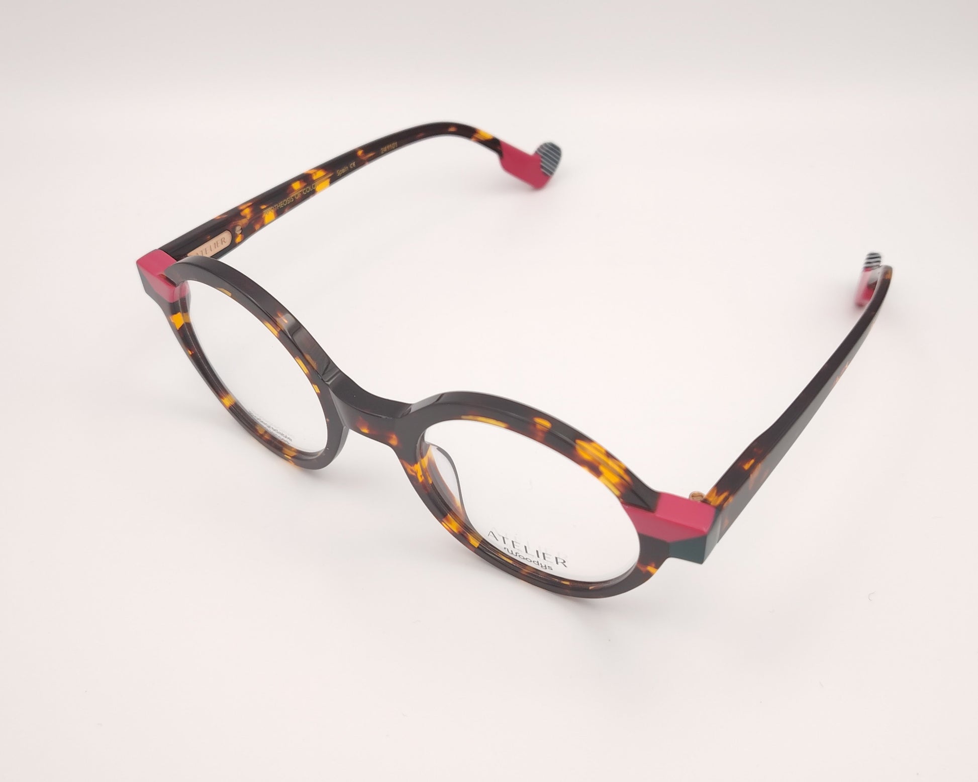 gafas graduadas woodys absinthe 02 redondas carey con detalles en rosa fucsia y verde

