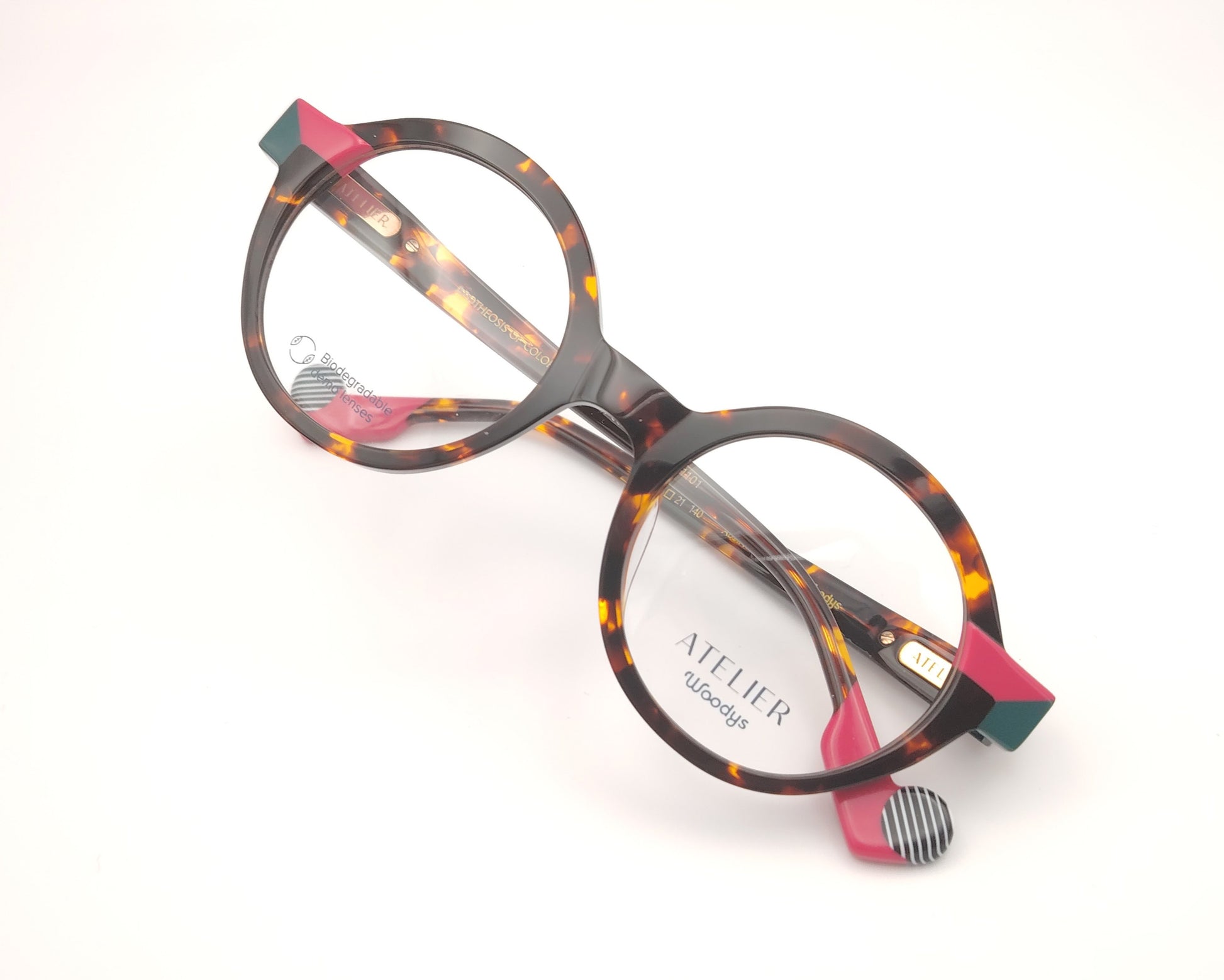 gafas graduadas woodys absinthe 02 redondas carey con detalles en rosa fucsia y verde

