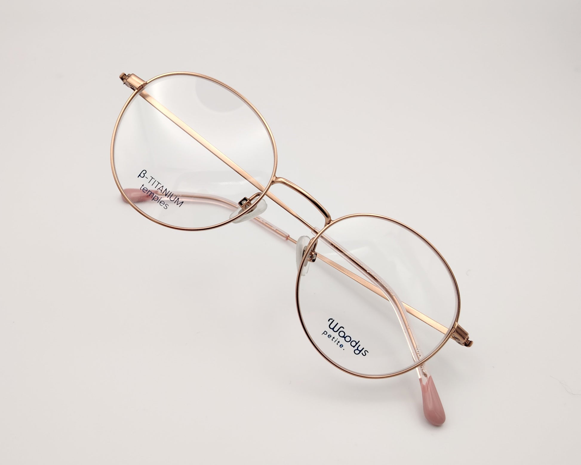 gafas woodys alix 03 de titanio dorado y forma redonda 