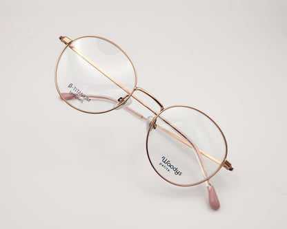 gafas woodys alix 03 de titanio dorado y forma redonda 
