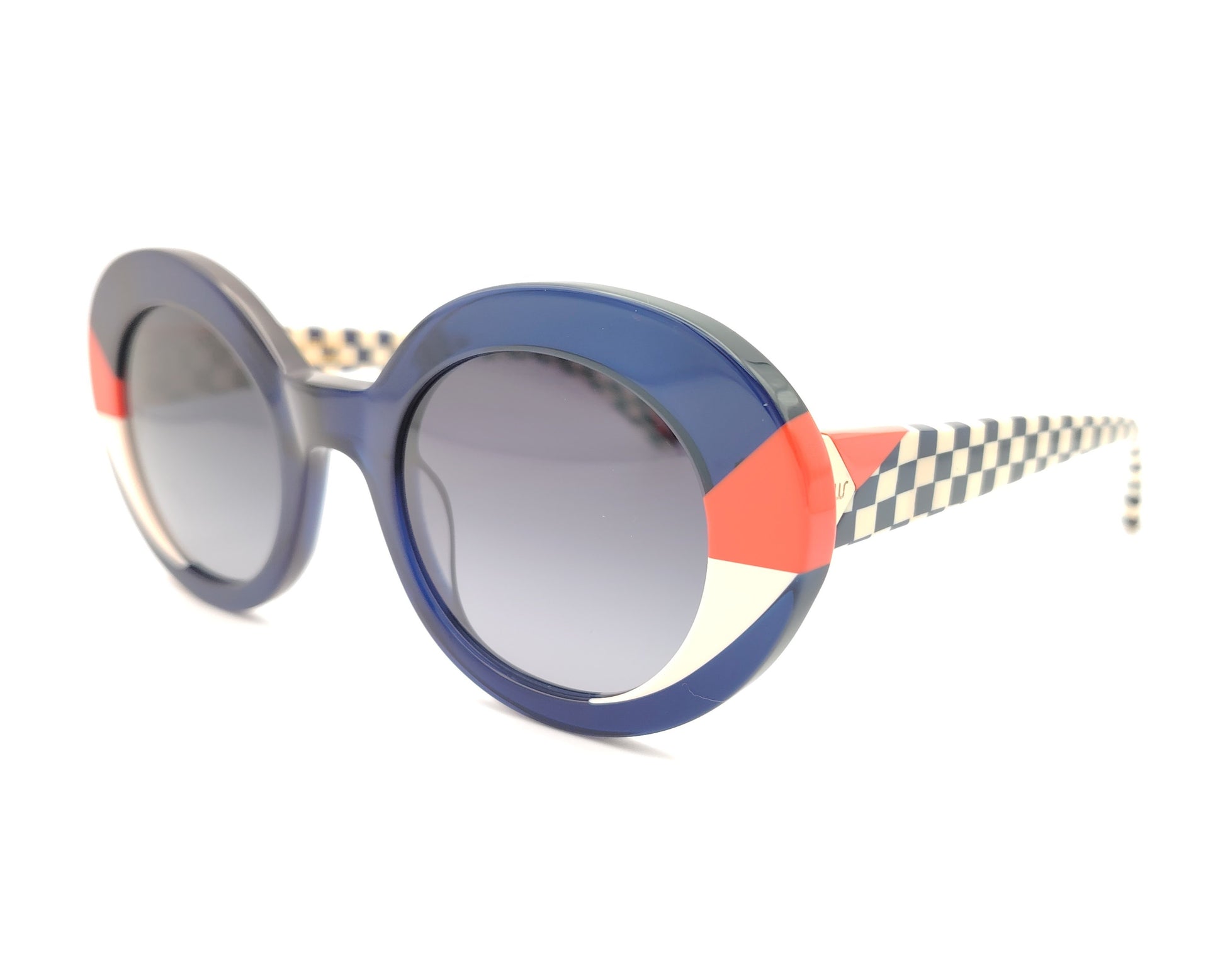 gafas de sol redondas  azules con detalles rojo y blanco y varillas estampadas geometricas