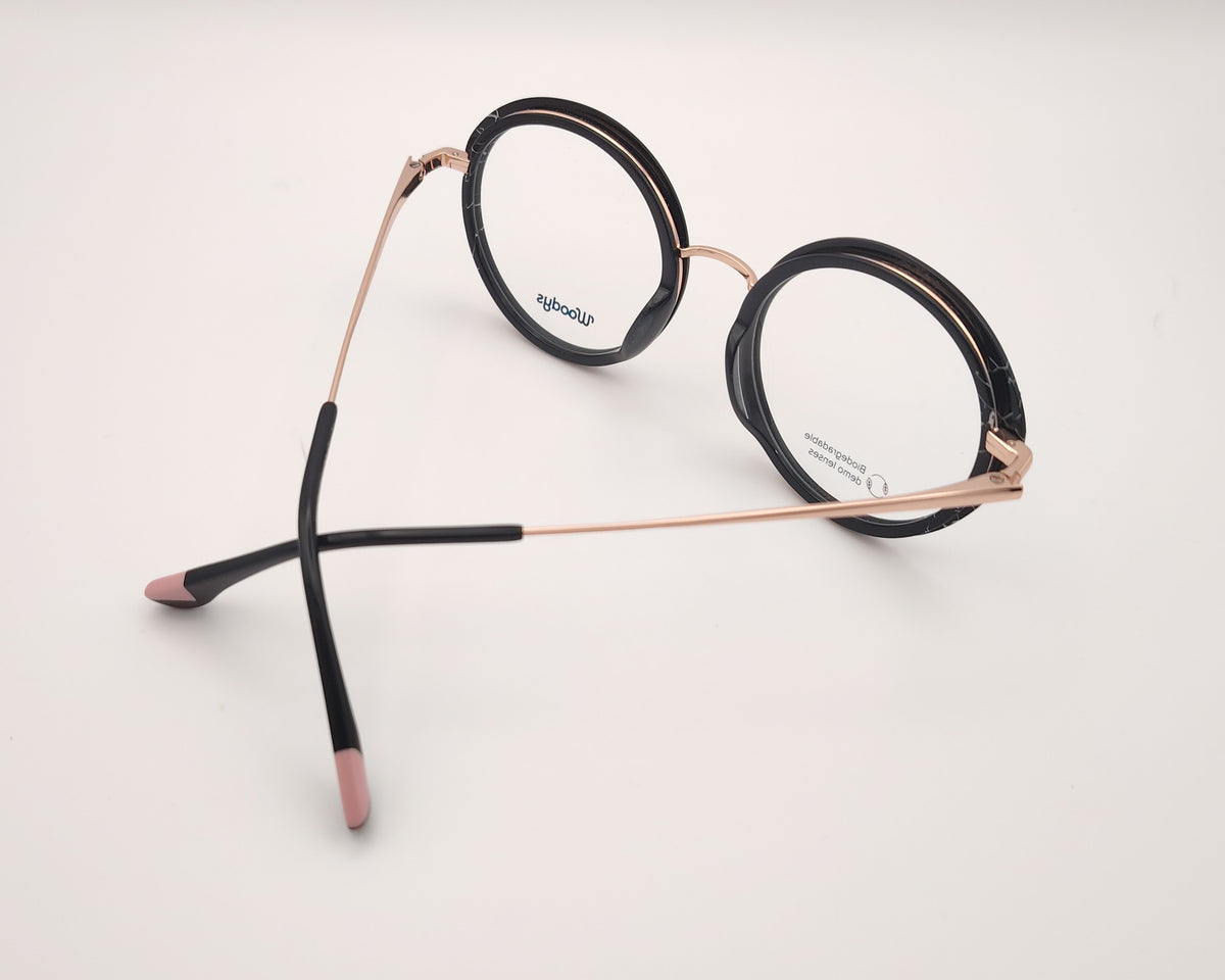 gafas graduadas woodys redondas doradas con aro en pasta negra para caras pequeñas