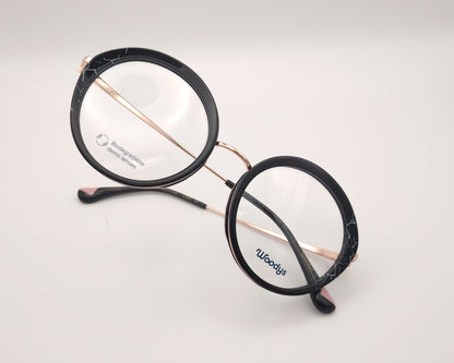 gafas graduadas woodys redondas doradas con aro en pasta negra para caras pequeñas