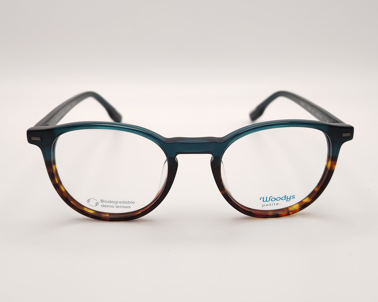 gafas graduadas woodys flynn 03 con montura de acetato en un elegante degradado de azul petróleo a habana diseño de inspiración clásica con un toque contemporáneo varillas en el mismo azul que el frente