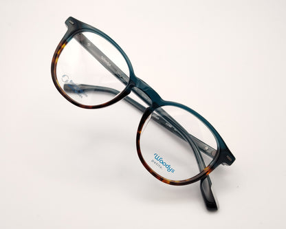 gafas graduadas woodys flynn 03 con montura de acetato en un elegante degradado de azul petróleo a habana diseño de inspiración clásica con un toque contemporáneo varillas en el mismo azul que el frente