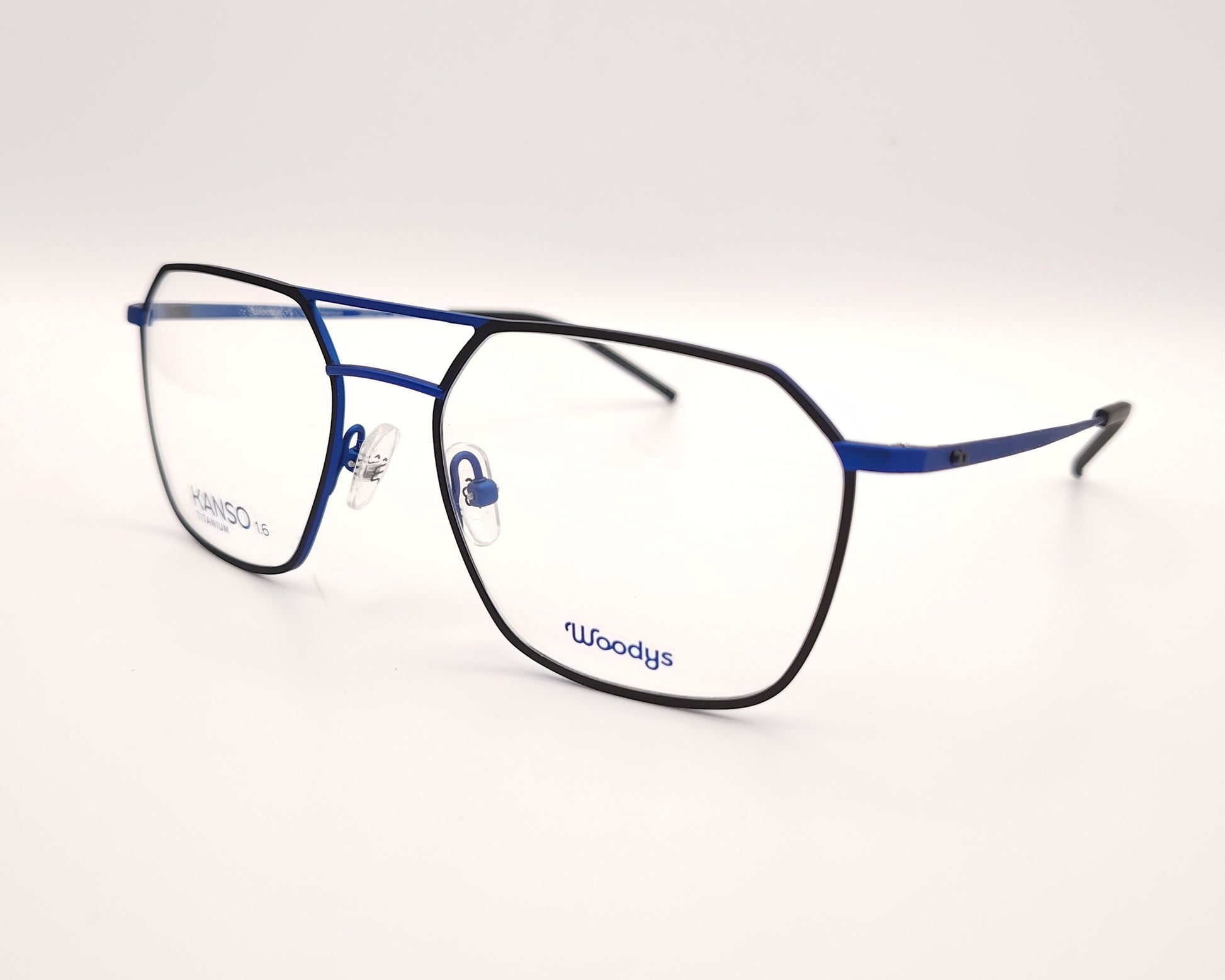 gafas graduadas geometricas oversize en titanio azul con doble puente y detalles negros