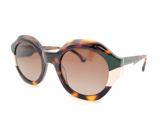 gafas de sol redondas carey con detalles en verde oscuro y crema en los extremos
