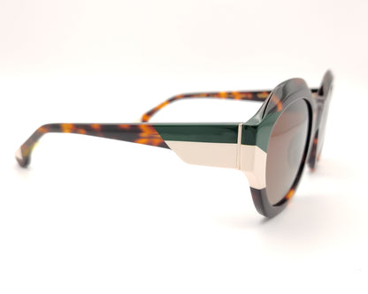 gafas de sol redondas carey con detalles en verde oscuro y crema en los extremos