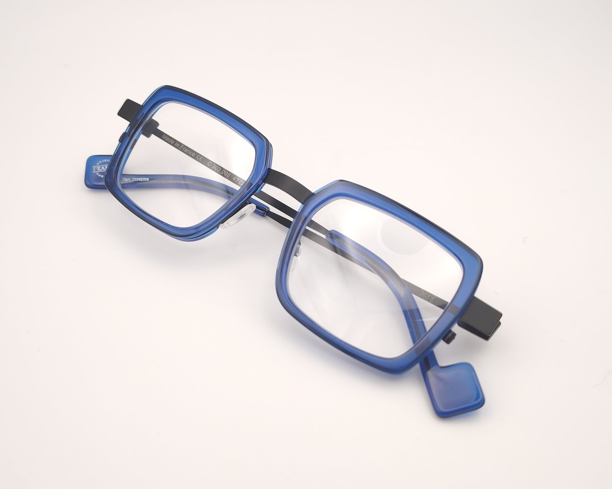gafas graduadas xit c303 rectangulares con frontal azul eléctrico y varillas metálicas negras

