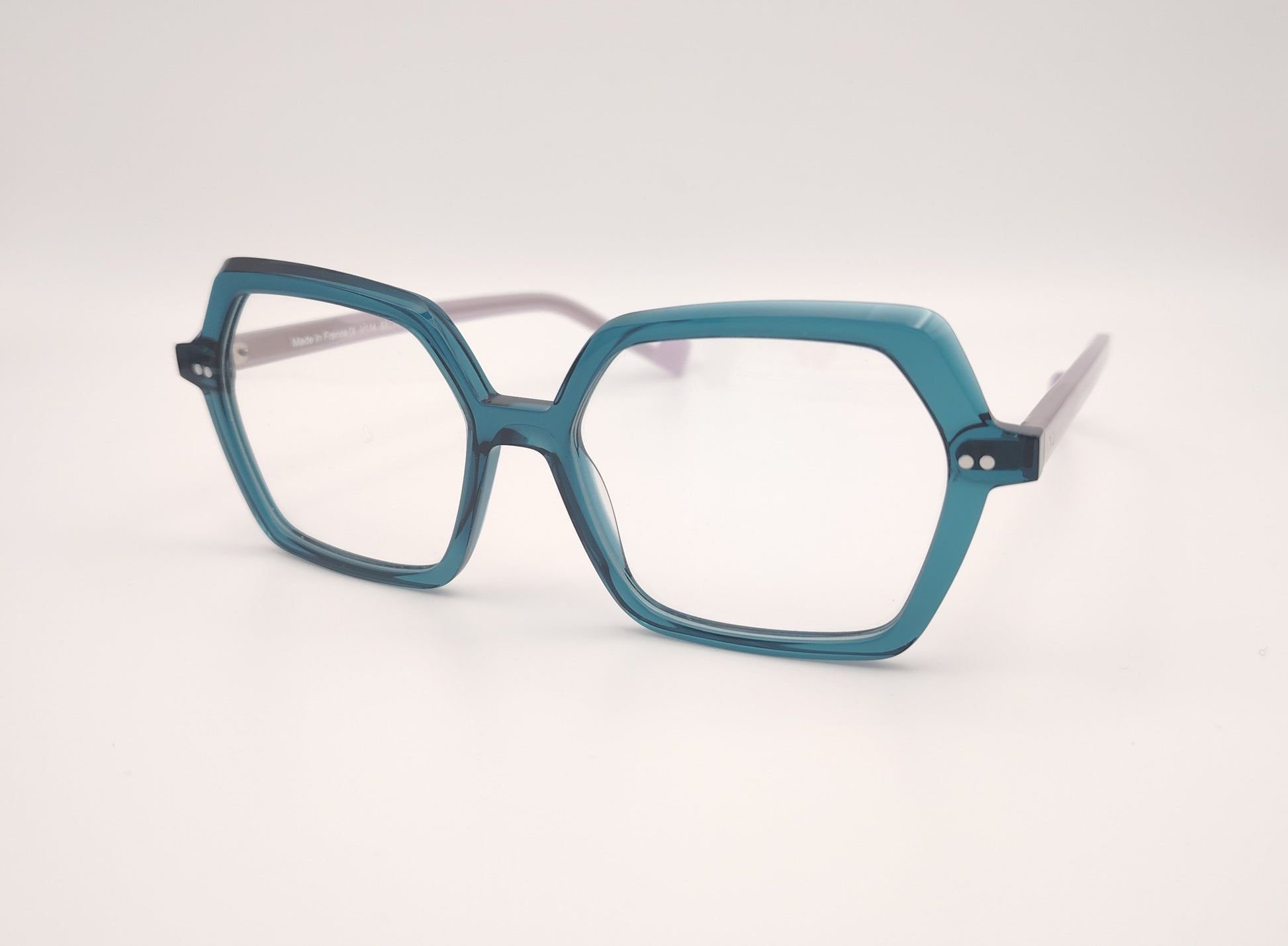 gafas xit v114 008 en acetato azul traslúcido con las varillas en gris de formato hexagonal