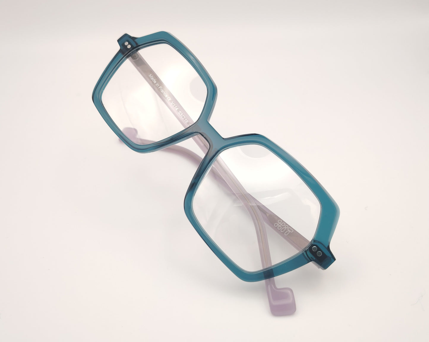 gafas xit v114 008 en acetato azul traslúcido con las varillas en gris de formato hexagonal