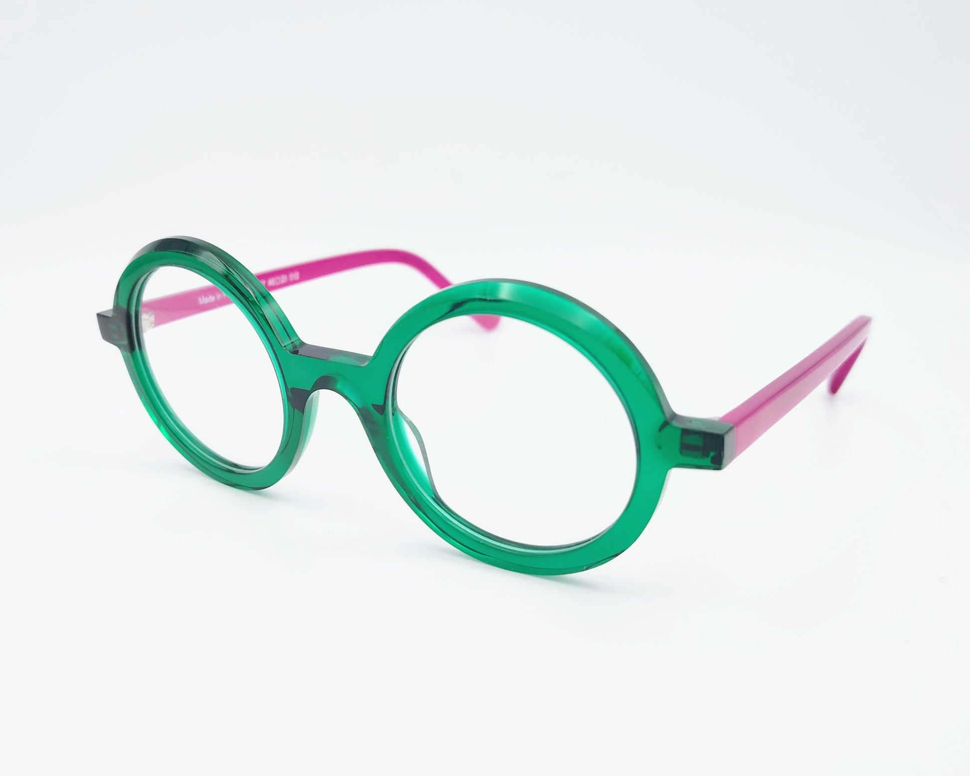 gafas graduadas xit v117 redondas con frontal verde transparente y varillas fucsia